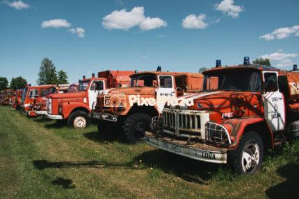 Line of Vintage Fire Trucks in Rural Estonia